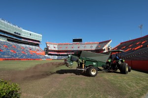 Finished compost being applied to Florida Field in October 2015