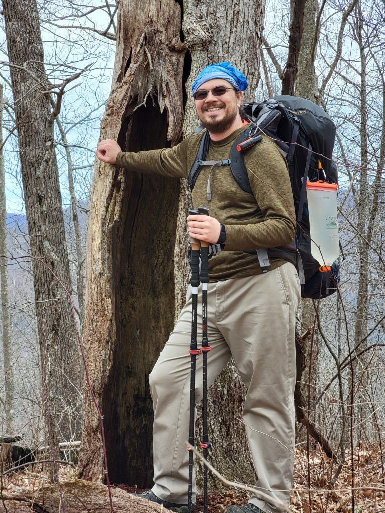 UF Staff and Environmental Science Professor, Danny Coenen, outdoors while hiking. 
