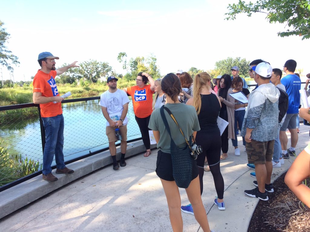 Michael Volk talks to a group of students.