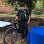 Police poses with their bicycle