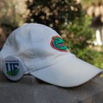 White UF hat with Sustainable UF button