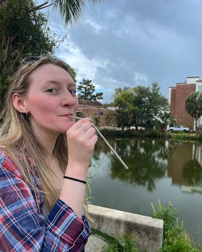 UF student Shayna Morgan with a reusable metal straw.