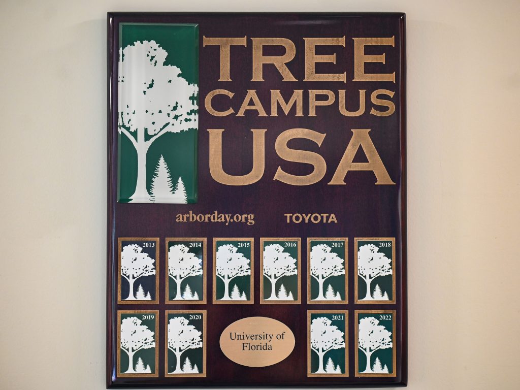 Tree Campus designation plaque for 10 consecutive years of the award at UF. 