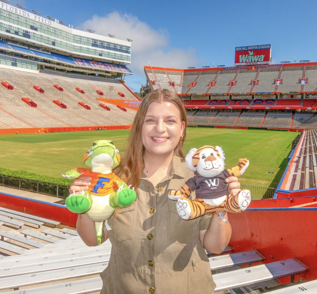 Jess Mercier, Green Gator of the Month and UF Study Abroad staff member, at Ben Hill Griffin Stadium. 
